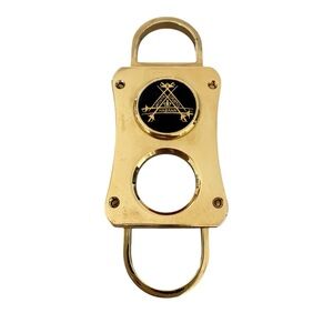 Montecristo gold tone cigar cutter preowned